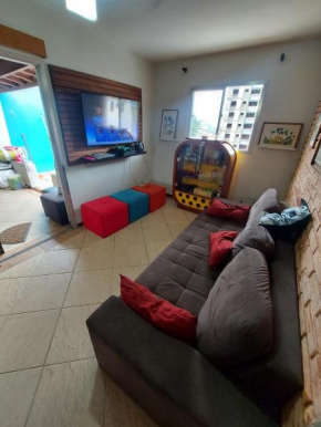 Cobertura com churrasqueira na praia da Enseada.